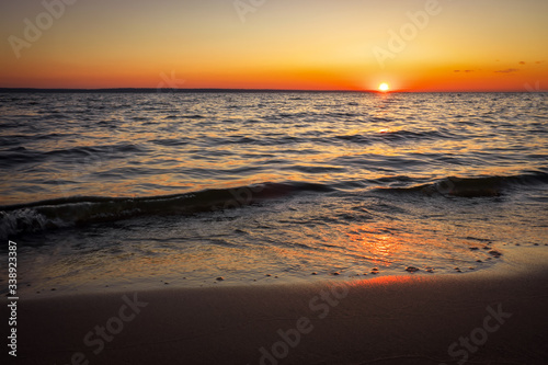 Colorful ocean beach sunrise. Dawn over the sea. Nature composition