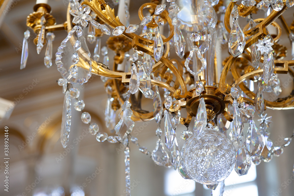 luxury crystal chandelier close up. Glamour background with copy space