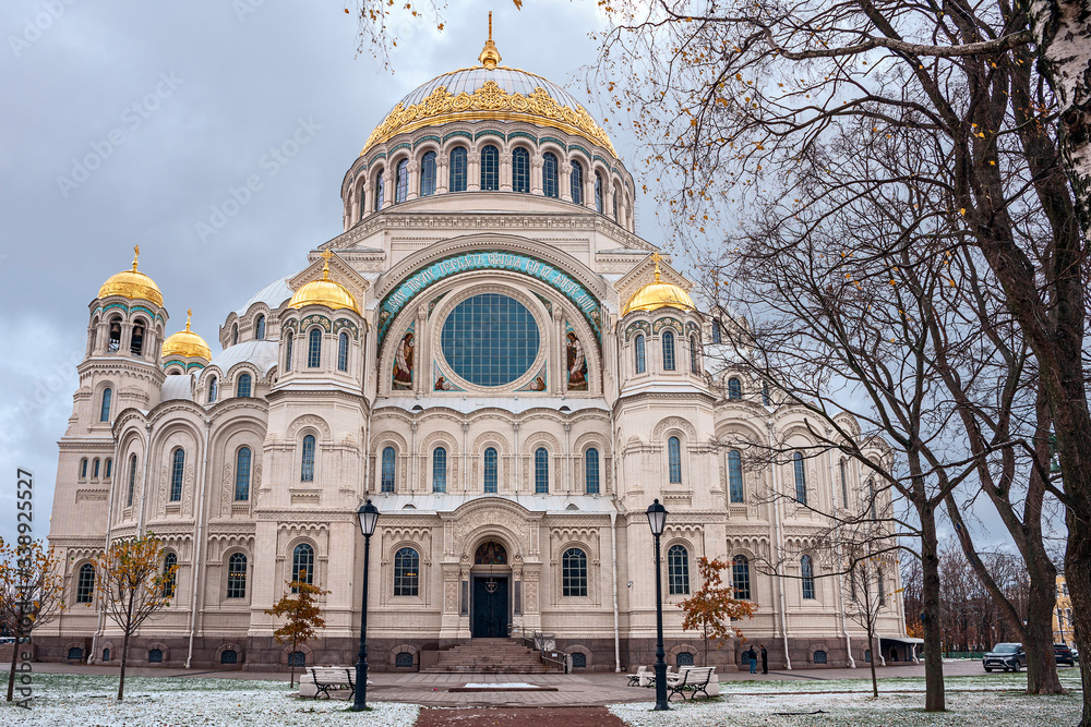 Front view of the facade of the Naval Cathedral in Kronstadt, Russia on a background of gray autumn sky