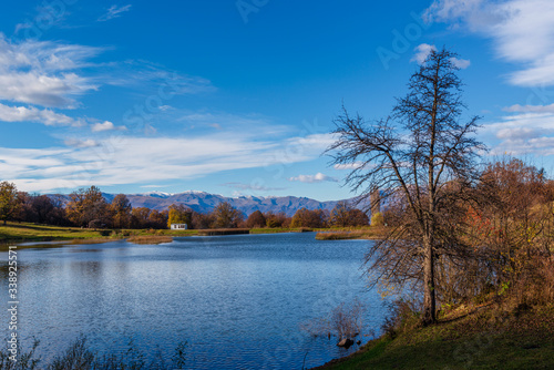 Fototapeta Naklejka Na Ścianę i Meble -  Beautiful landscape with Tsover lake and arrounded mountains and trees, Armenia