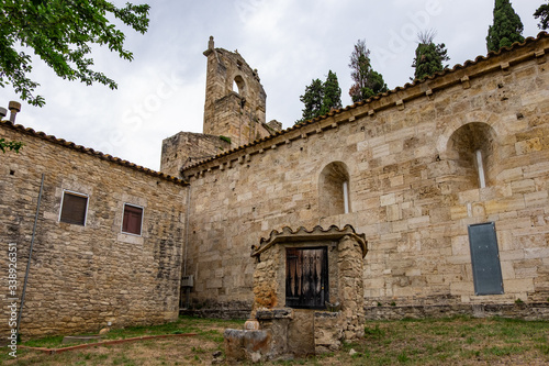 Santa Maria de Porqueres romanic church in Lake of Banyoles, Catalonia, Spain. photo