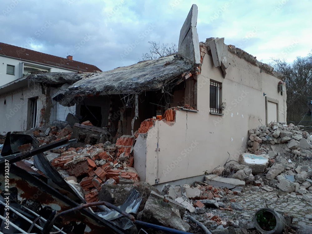 Remains of destroyed residual building. Demolished destructed house