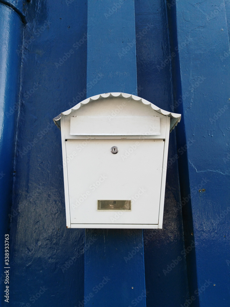 white mail box on blue background white mail box on blue background