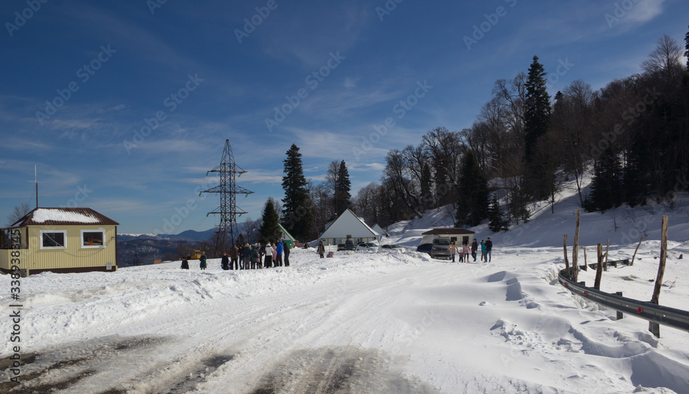 Beautiful mountains covered with snow. Sunny day and blue sky on a frosty day