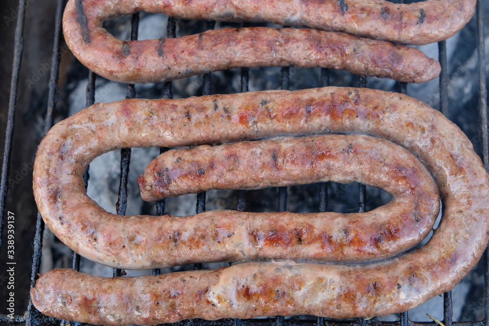 South African Braai Meat on the barbecue grill charcoal fire cooking
South African Braai Meat on the barbecue grill charcoal fire cooking