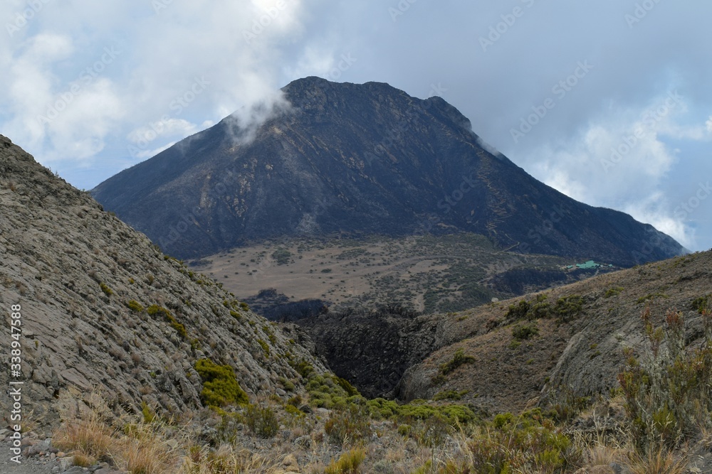 Scenic mountain landscapes against sky in rural Tanzania, Mount Meru, Arusha National Park