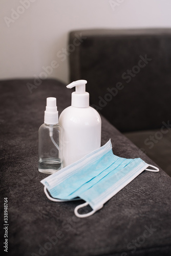 Set of germ protection with sanitary masks, sanitizing gel and alcohol spray, prevent germs coronavirus or covid-19 (2019-ncov). Prevention of germs by yourself.
