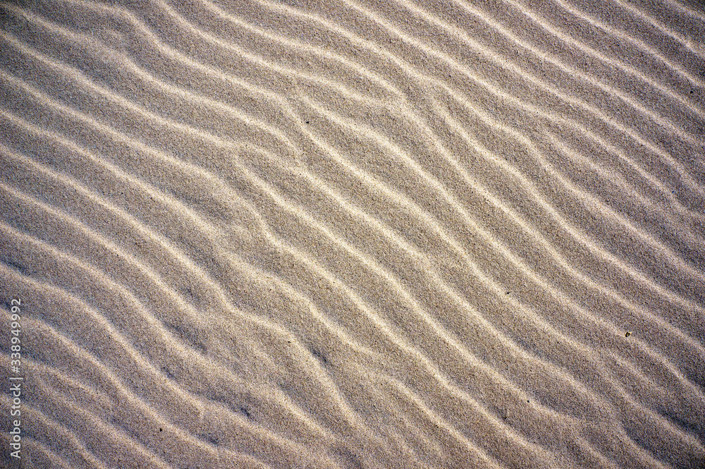 Wavy lines pattern on sand of dunes on beach. Wavy lines pattern on sand of dunes on beach.