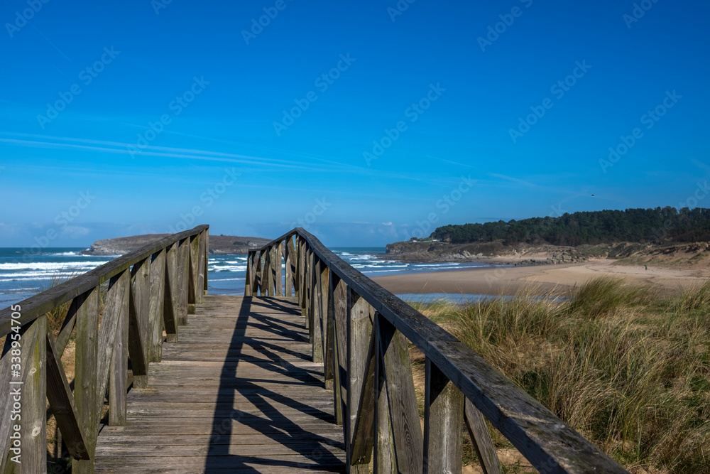 wooden bridge. Loredo Beach. Cantabria, Spain