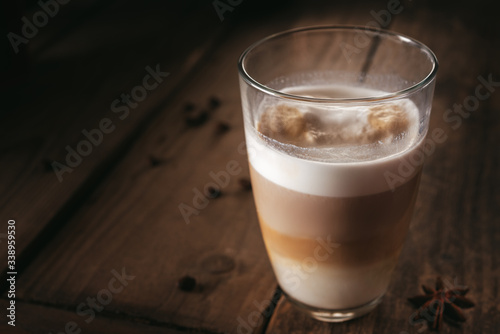 Latte in a glass on the table