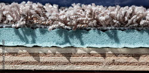 Bilde på lerret Carpet, padding, and plywood layers for installation of flooring