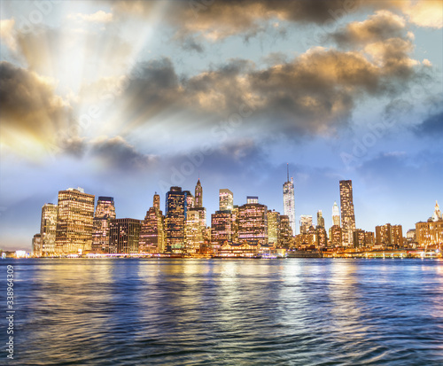Lower Manhattan skyline at sunset  panoramic view from Brooklyn  New York - USA