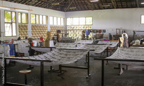 Girls painting in batik school in Mataram Lombok