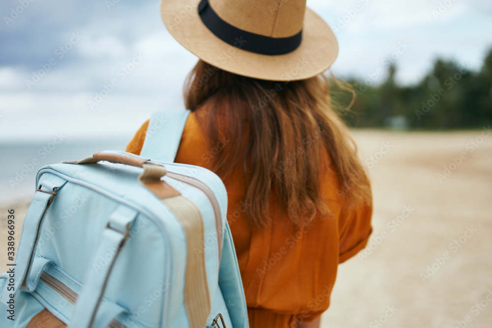 Woman traveler backpack island tropics destinations