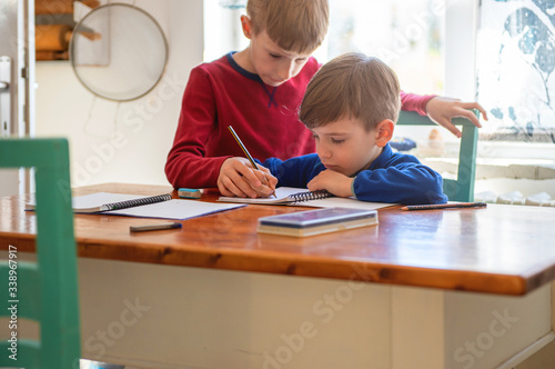 Brothers learning at home, Homeschooling
