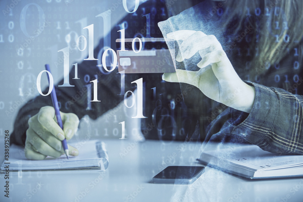 Double exposure of woman on-line shopping holding a credit card and data theme hologram drawing. E-commerce concept. Double exposure of woman on-line shopping holding a credit card and data theme hologram drawing. E-commerce concept.