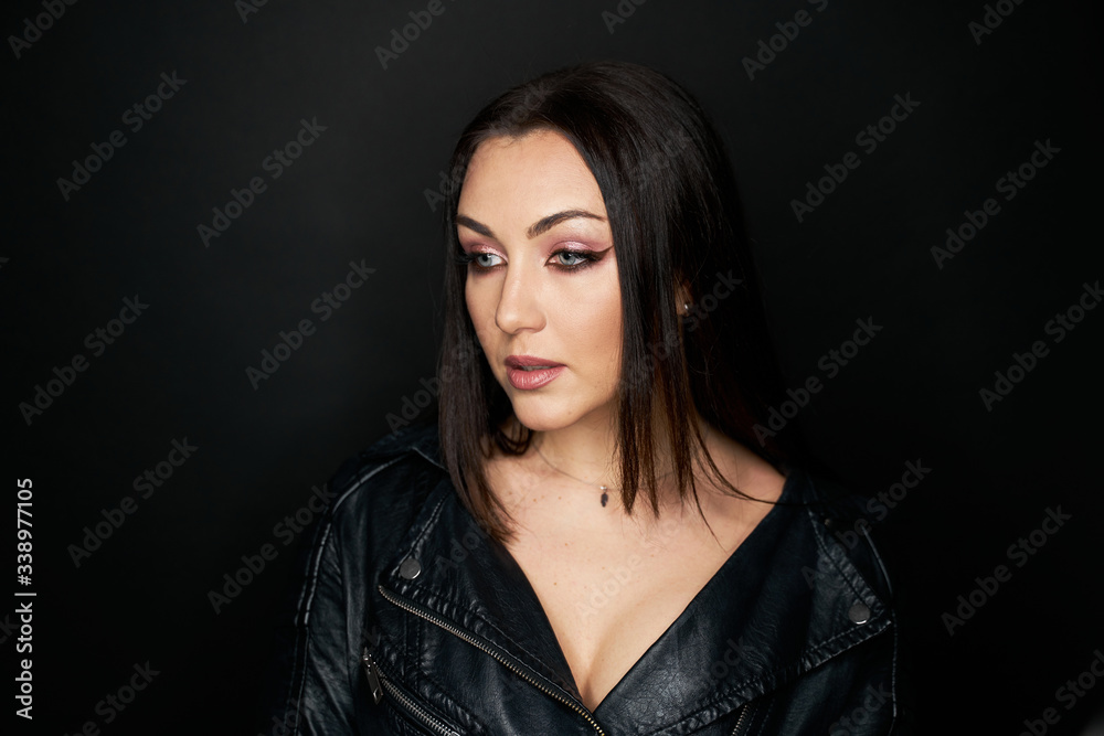 Beautiful Black hair woman beautiful portrait. Hairstyle curly hair beauty female model girl over dark background Beautiful Black hair woman beautiful portrait. Hairstyle curly hair beauty female model girl over dark background