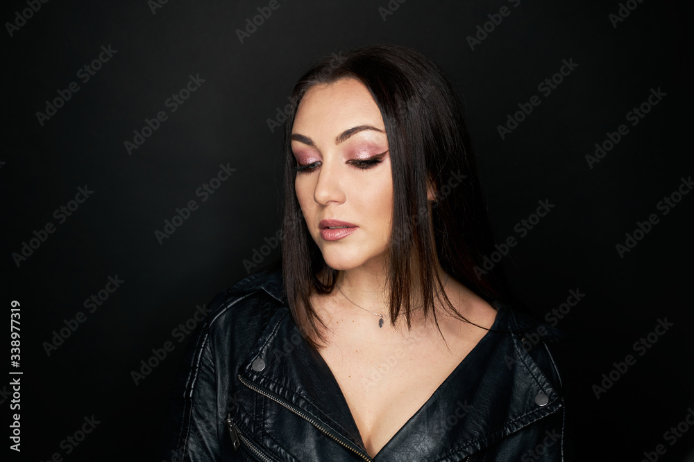 Beautiful Black hair woman beautiful portrait. Hairstyle curly hair beauty female model girl over dark background Beautiful Black hair woman beautiful portrait. Hairstyle curly hair beauty female model girl over dark background