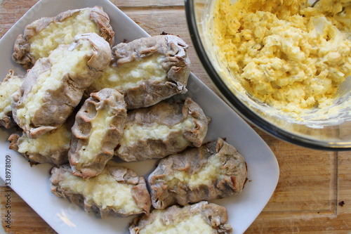 Cooked Karelian pies - Pirakka on a baking sheet. Dish of national cuisine - piirakka. Close-up. photo