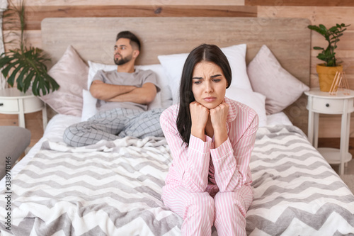 Sad couple after quarrel in...