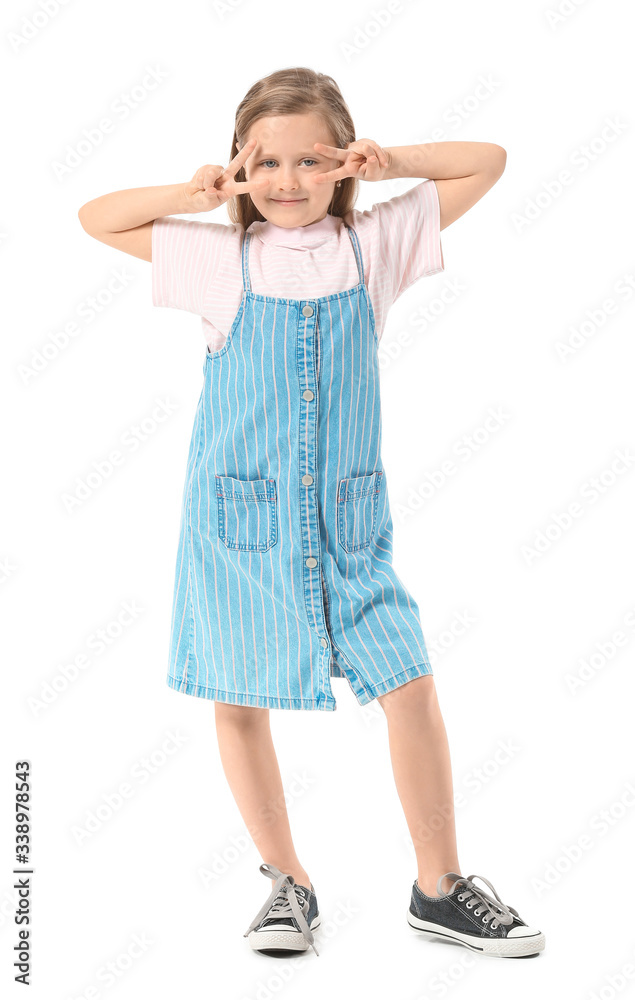Cute little girl showing victory gesture on white background Cute little girl showing victory gesture on white background