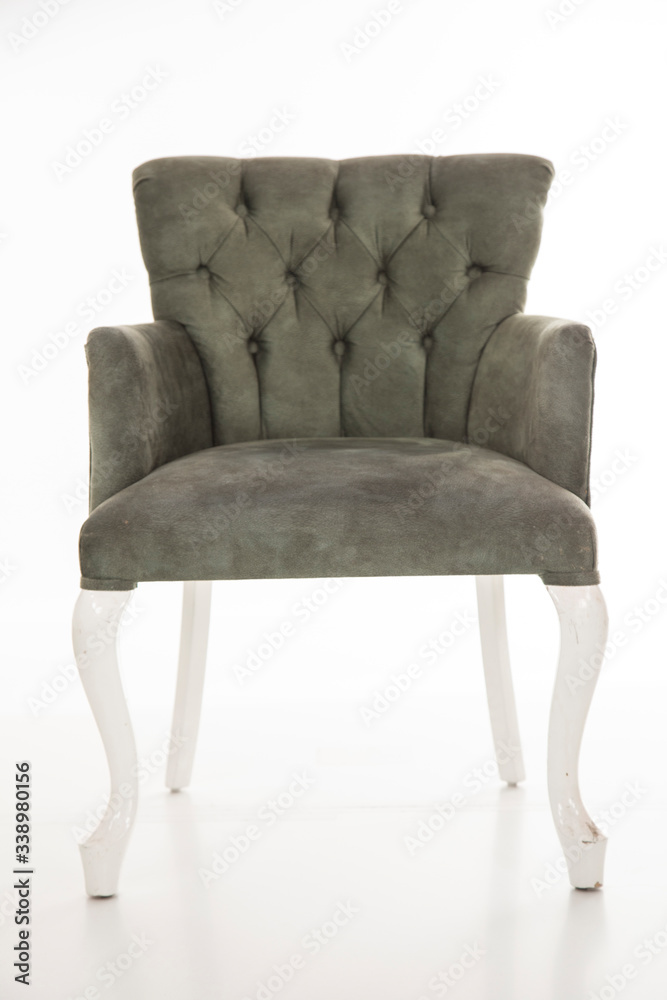 a retro chair in front of a white background a retro chair in front of a white background