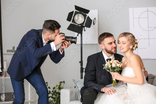 Photographer working with y...