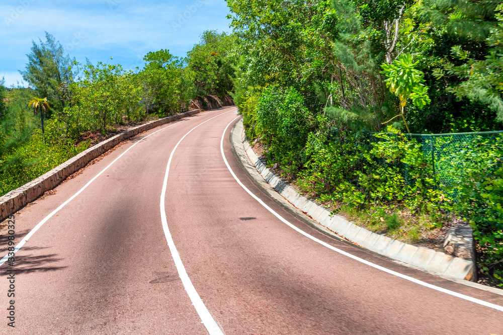 Beautiful road along Praslin coastline, Seychelles Beautiful road along Praslin coastline, Seychelles