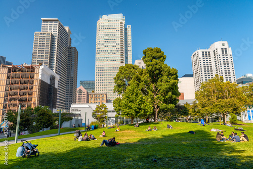 SAN FRANCISCO - AUGUST 6, 2017: Yerba Buena Gardens and city buildings in summer season photo