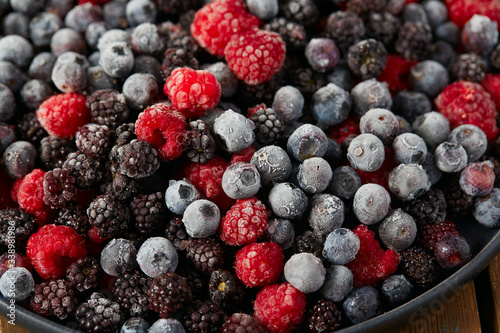 frozen raspberries  blackberries and blueberries close up