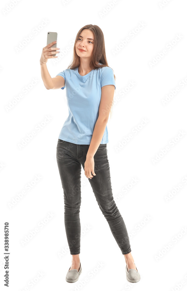 Beautiful young woman with mobile phone on white background Beautiful young woman with mobile phone on white background