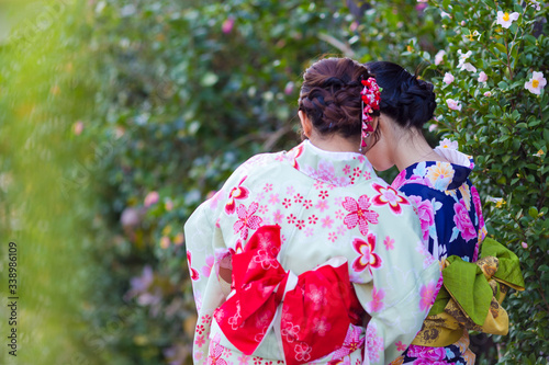 Asian Destinations. Two Young Female Geishas in Traditional Japanese Silk Kimono Taking Selfie Pictures in Kyoto City,  Japan.