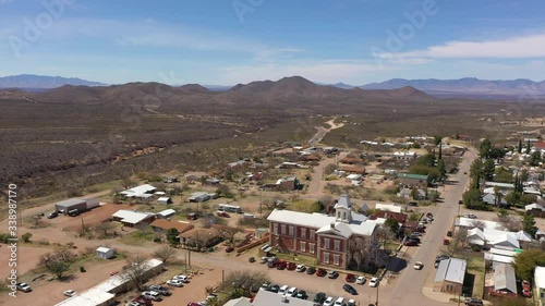 Wallpaper Mural An old courthouse in the peaceful city of Tombstone, Arizona by the mountains - aerial Torontodigital.ca