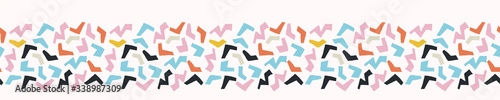 Ditsy bright confetti shapes seamless vector border pattern. Stylized paper cut out banner backgrounsd. Kawaii modern retro fun ribbon trim. candi childish bright sprinkles masking washi tape. photo