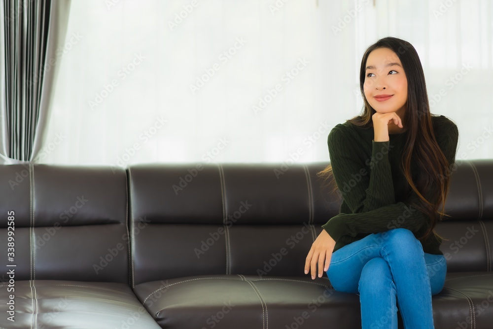 Beautiful portrait young asian woman sit relax on sofa Beautiful portrait young asian woman sit relax on sofa