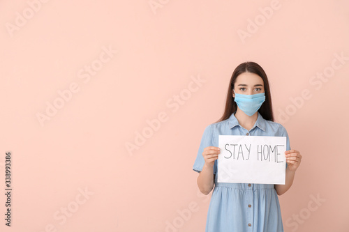 Young woman in medical mask...