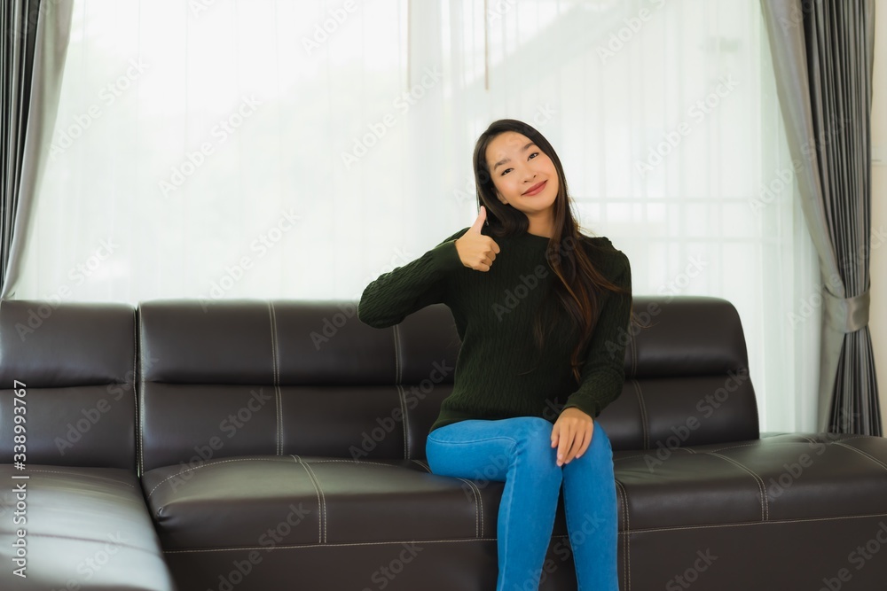 Beautiful portrait young asian woman sit relax on sofa Beautiful portrait young asian woman sit relax on sofa