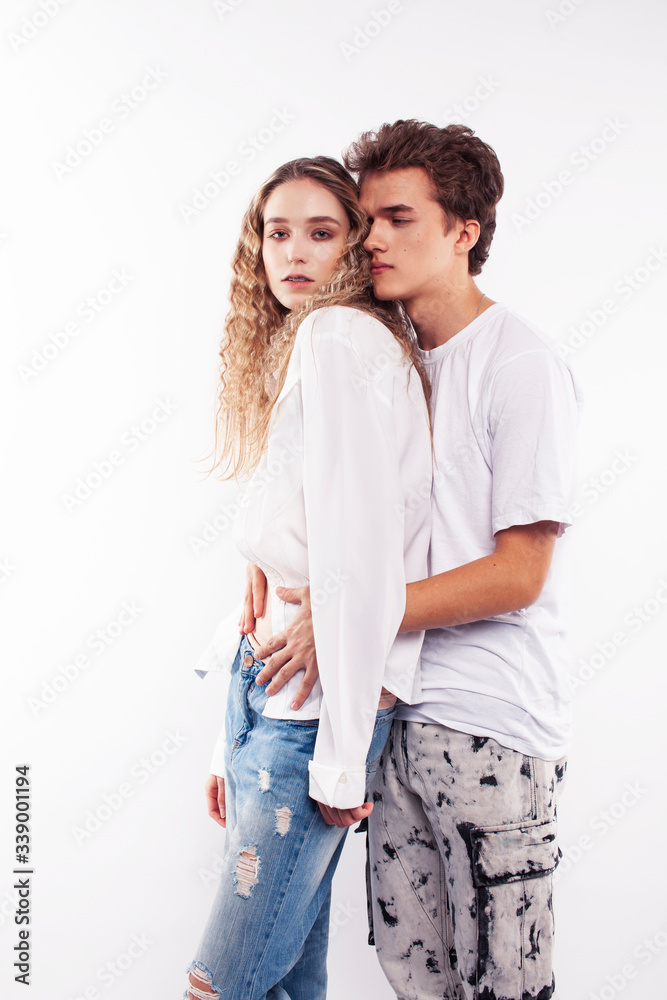 young pretty couple together posing cheerful isolated on white background, lifestyle people concept, happy boy and girl young pretty couple together posing cheerful isolated on white background, lifestyle people concept, happy boy and girl