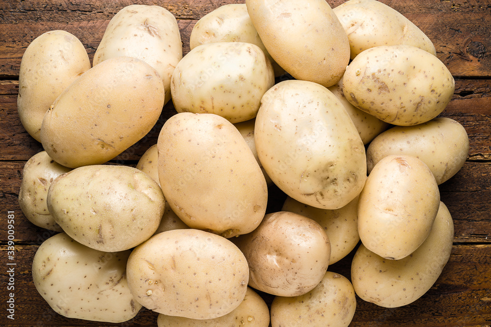 Top view fresh organic potatoes on table top Top view fresh organic potatoes on table top