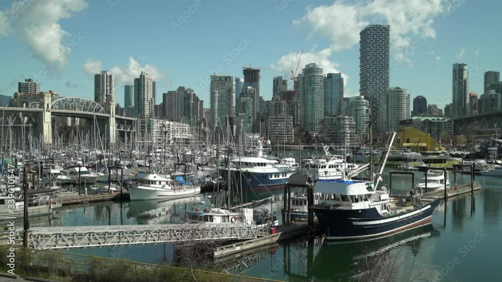 Fishermen’s Wharf Vancouver 4K UHD. Fish boats at Vancouver’s Fishermen’s Wharf near Granville Island. British Columbia, Canada. 4K UHD.
Fishermen’s Wharf Vancouver 4K UHD. Fish boats at Vancouver’s Fishermen’s Wharf near Granville Island. British Columbia, Canada. 4K UHD.