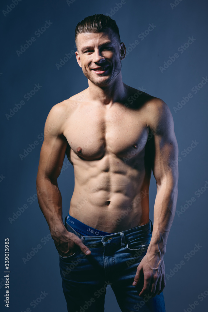 muscular young man posing