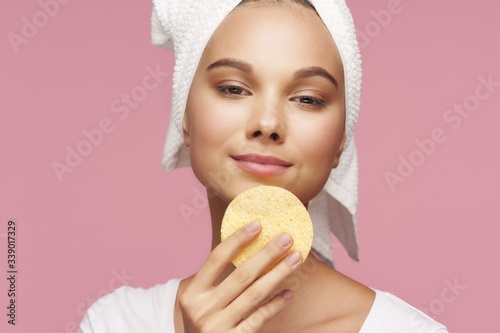 young woman with a sponge