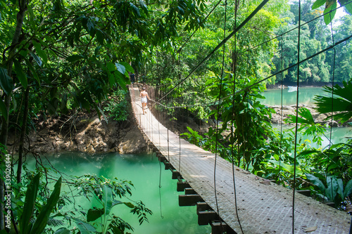 bridge over the river in middle of the jungle in Costa Rica