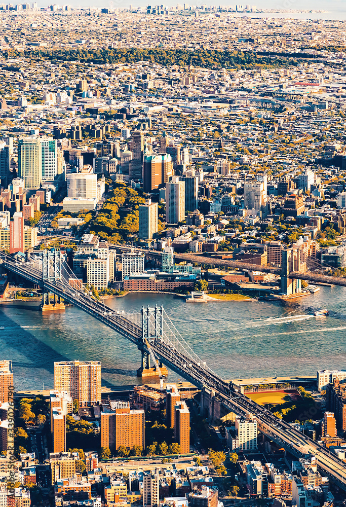 Fototapeta premium Aerial view of the Lower East Side of Manhattan the Brooklyn and Manhattan bridges