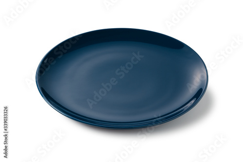 Navy blue plate placed on a white background