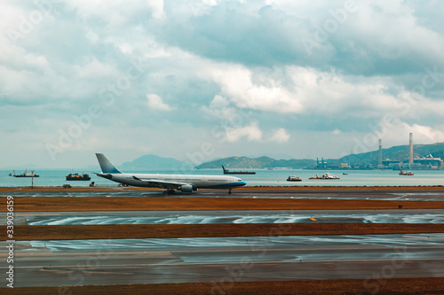 Airport with many airplanes at beautiful sunset