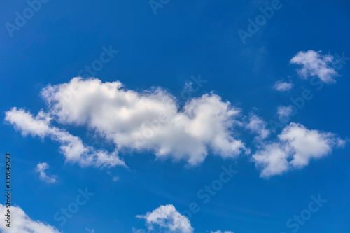 Blue sky with cloud background. With copy space for text or design.
