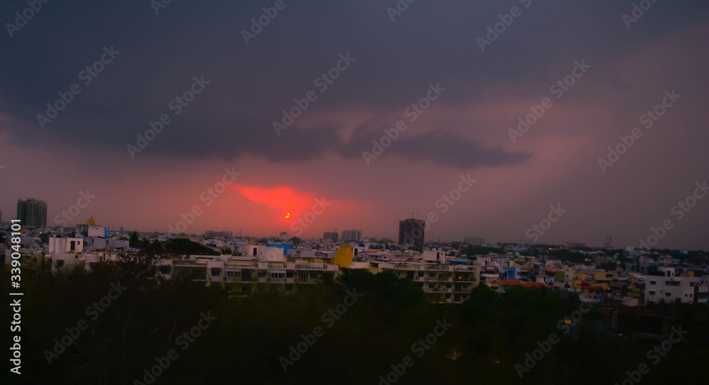 sunset over the city, selective focus on background