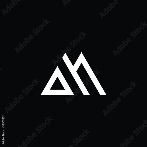 Minimal elegant monogram art logo. Outstanding professional trendy awesome artistic AM MA initial based Alphabet icon logo. Premium Business logo White color on black background