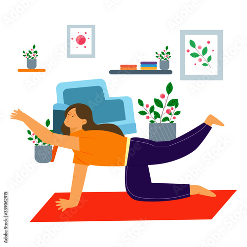Young women doing yoga activity at home. Stay at home and things to do in self isolation and social distancing during epidemic of corona virus.